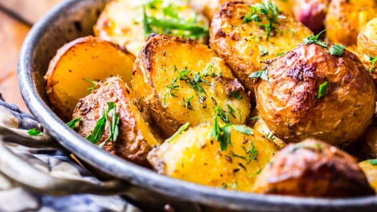 Roasted Potatoes with herbs in a pan