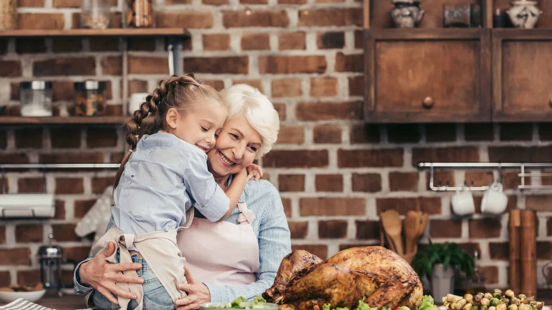 Grandma making turkey in the kitchen