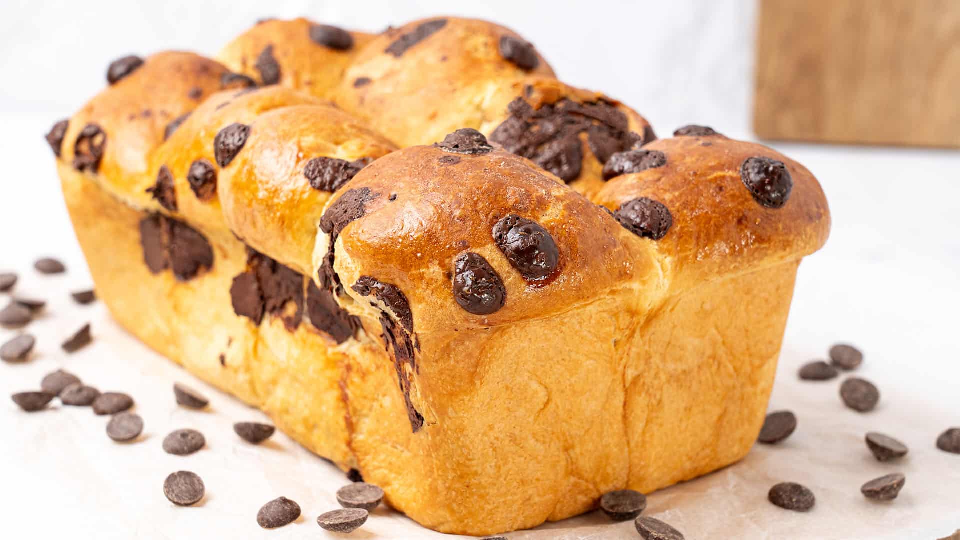 Chocolate chip brioche on a baking paper.