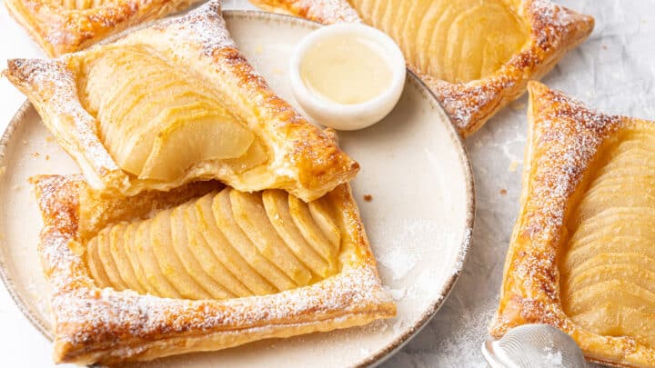 puff pastry tarts on a plate.