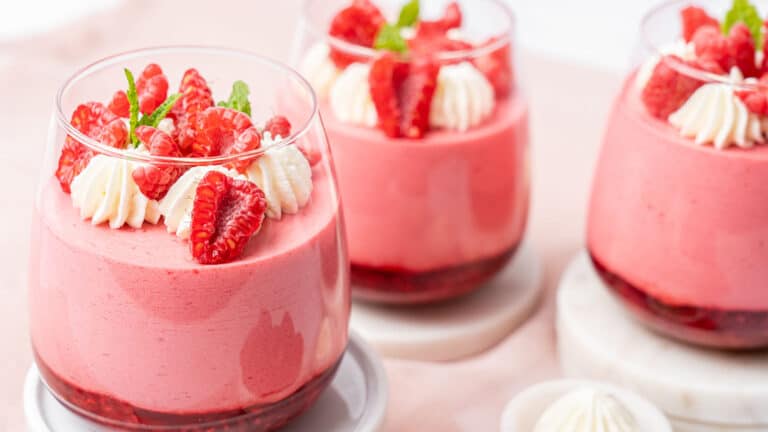 Raspberry mousse in a glass.